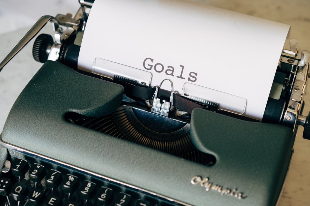 Goals written on a white sheet of paper from typewriter